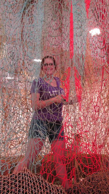 Colorful streamers around a female student