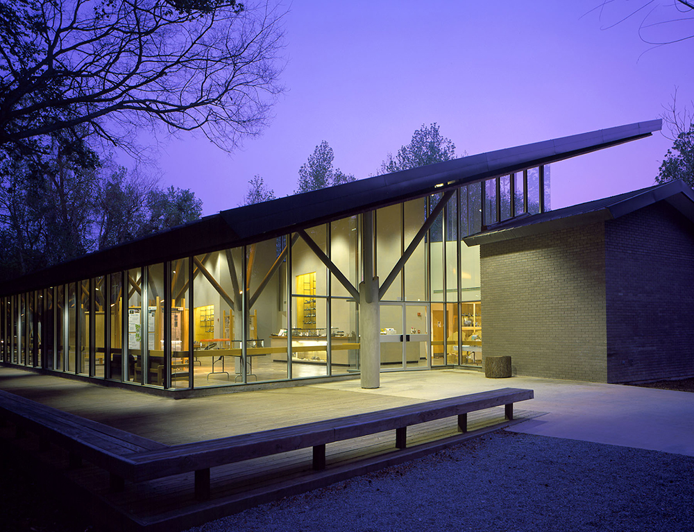 Building with glass windows illuminated at night