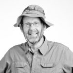 Bruce Sharky portrait, black and white, man in hat