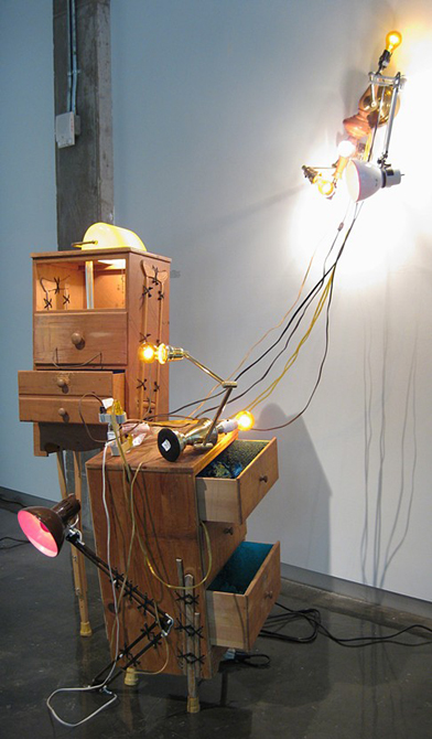 Wooden drawers open, lamps with cords.Cody Arnall LSU MFA Thesis