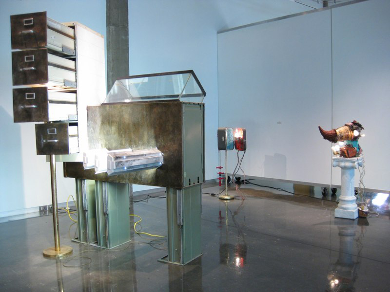 Desk drawers suspended , sculpture on pedestal.Cody Arnall LSU MFA Thesis