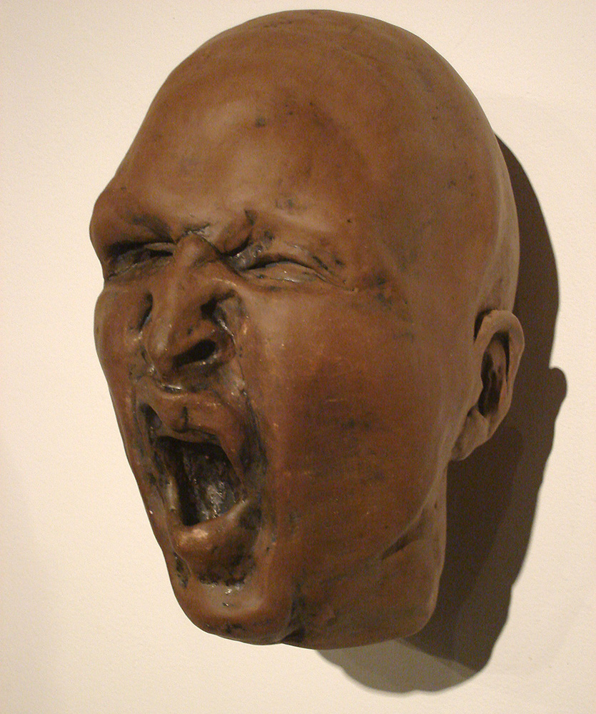 Yawning/sneering bald man, LSU BFA Studio Art Ceramics