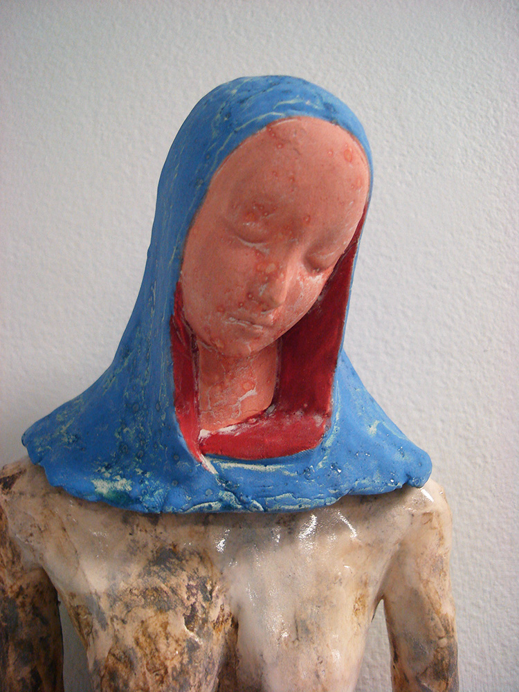 Figure like Virgin Mary with blue hood, LSU BFA Studio Art Ceramics