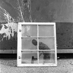 Figure in window pane, lsu photography alumni