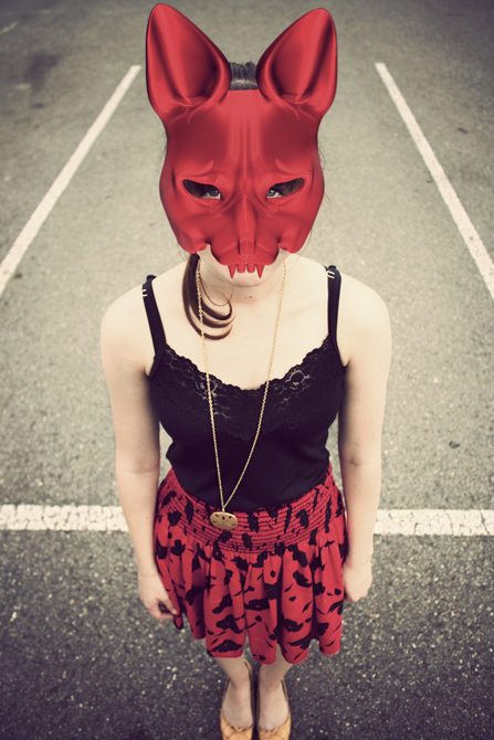 Girl with red animal mask simulated over face.LSU BFA Studio Art Digital Art