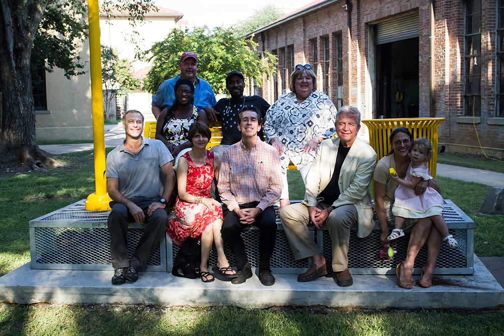 group portrait in sculpture garden