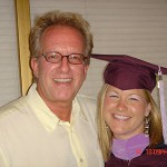 Ray Scott with young woman in graduation cap