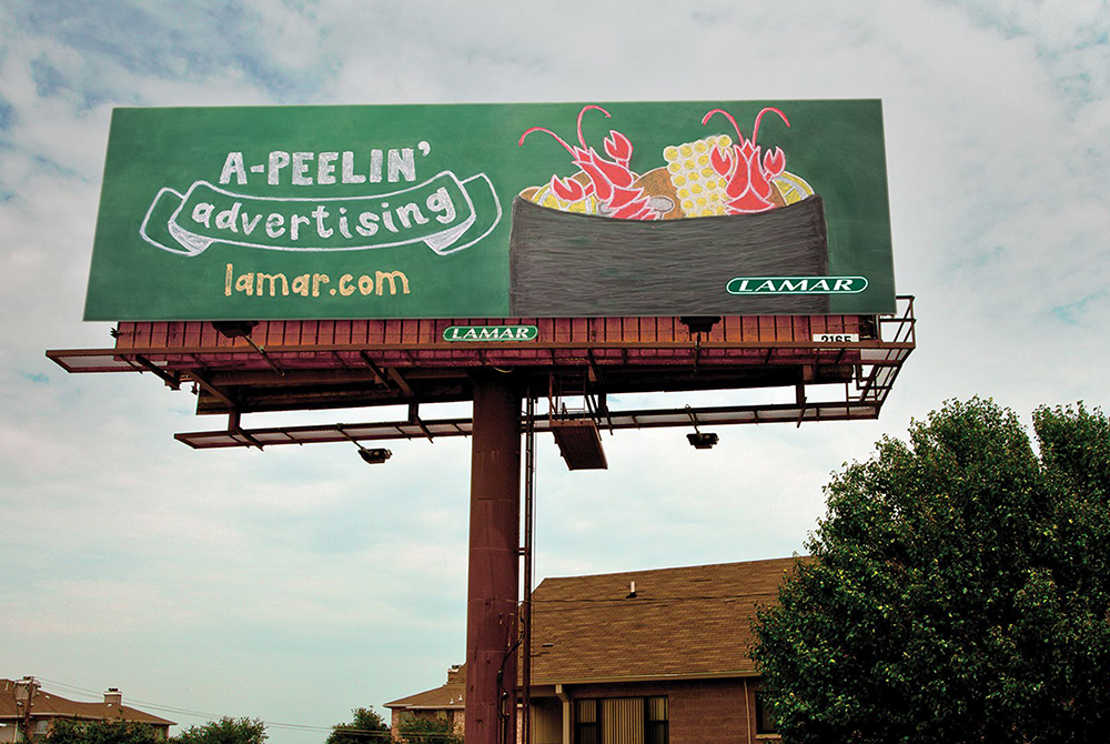 billboard with crawfish and corn in pot