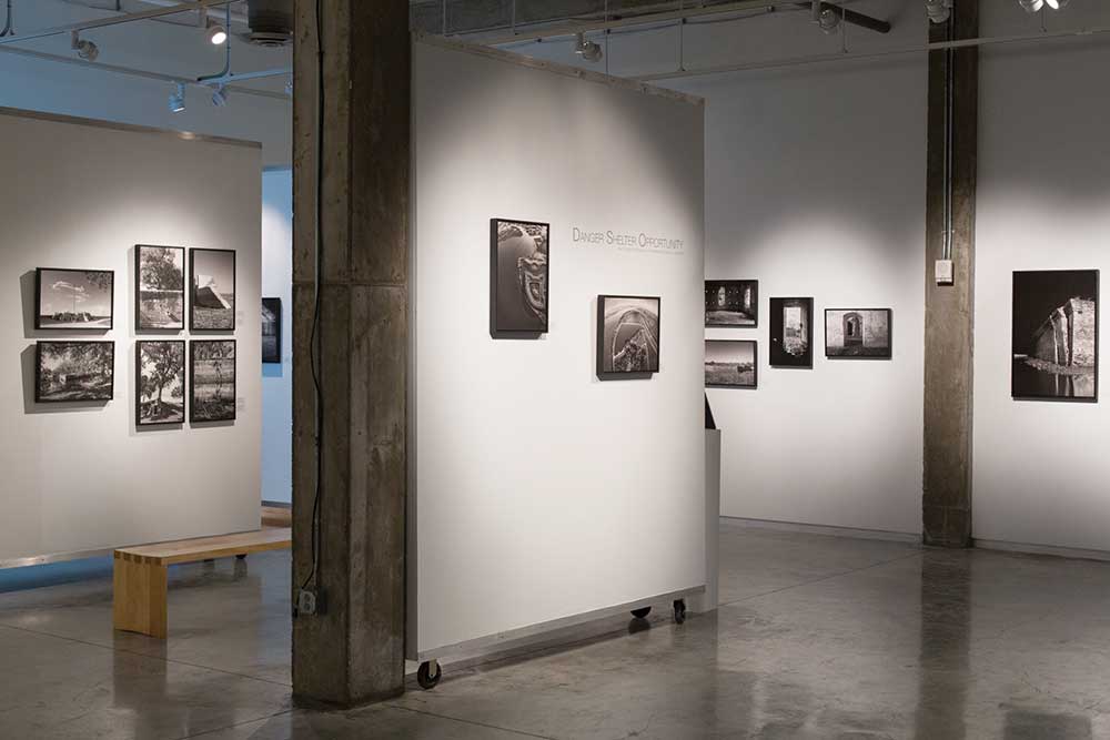 Gallery with photography on white walls