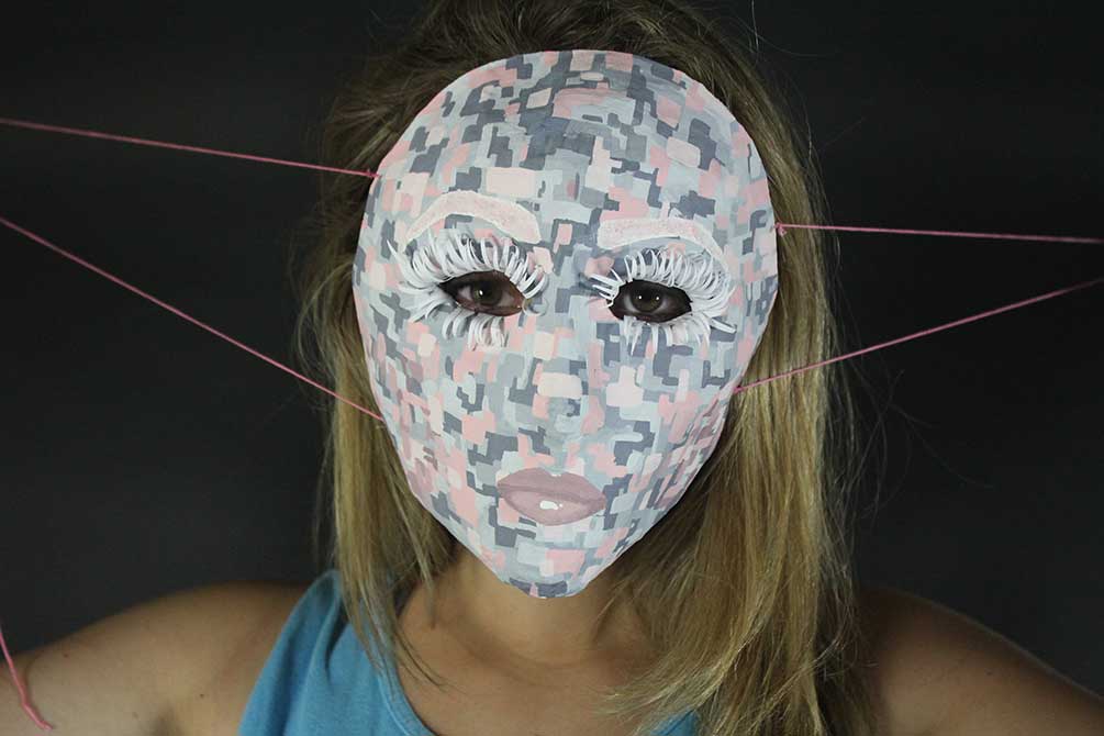 girl wearing a mask