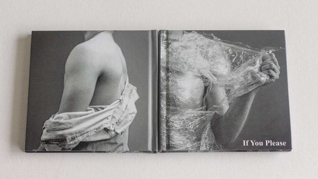 Book with photography of body, text