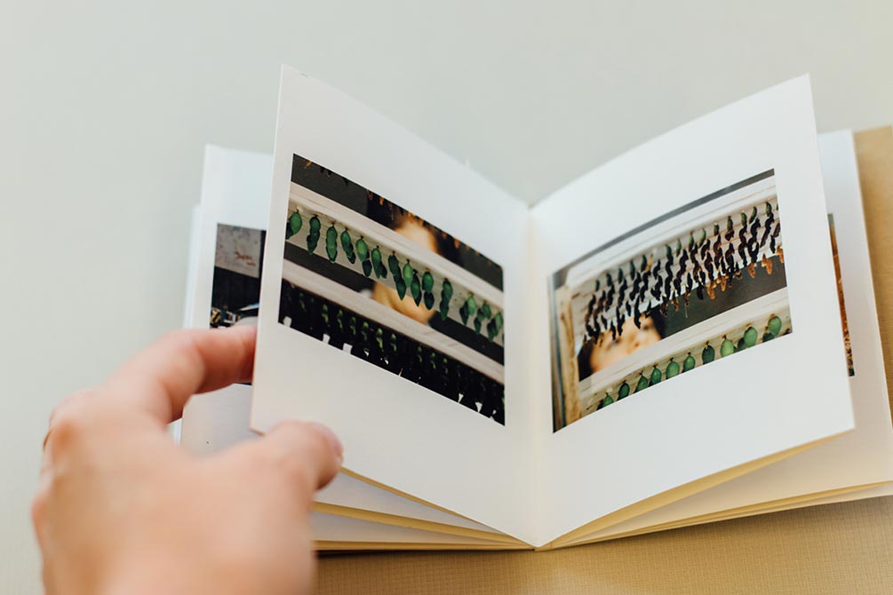 hand turning book pages.lsu photography student work