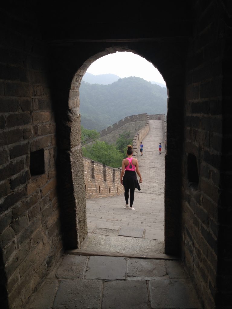 Figure in doorway walking on Great Wall