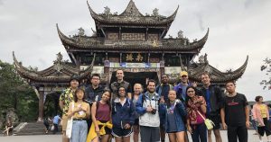 students by Chinese temple