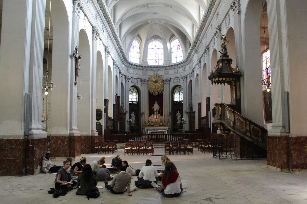 sitting on church floor