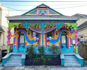 New Orleans house decorated with colorful Mardi Gras sculptures