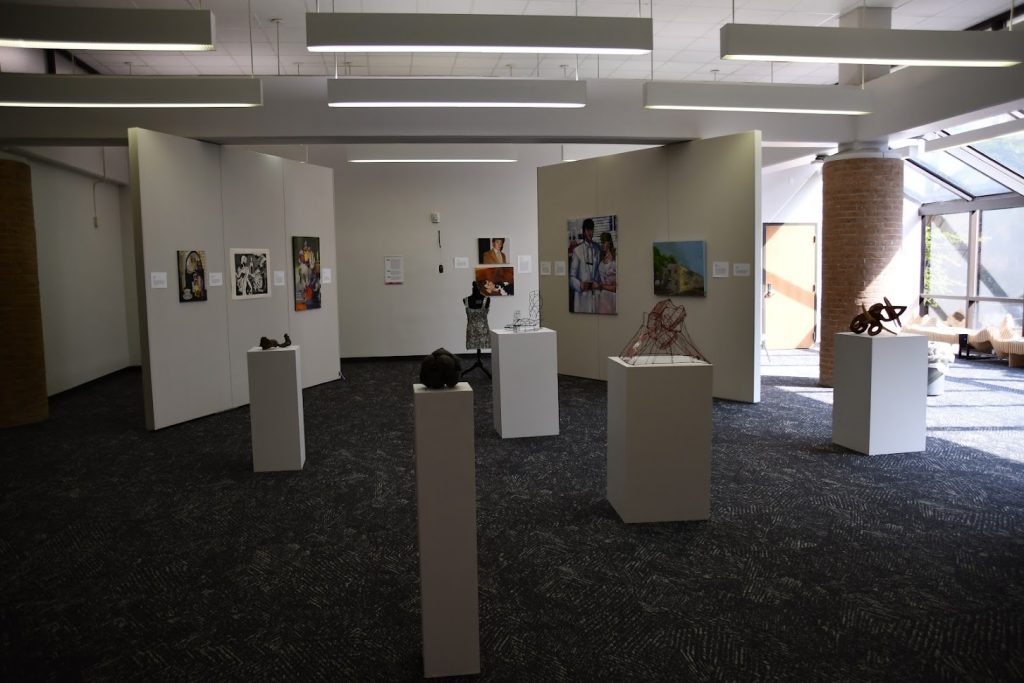 sculptures and painting, prints on display