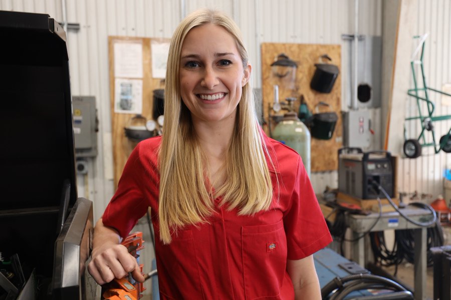 Cecelia in red jumpsuit in studio