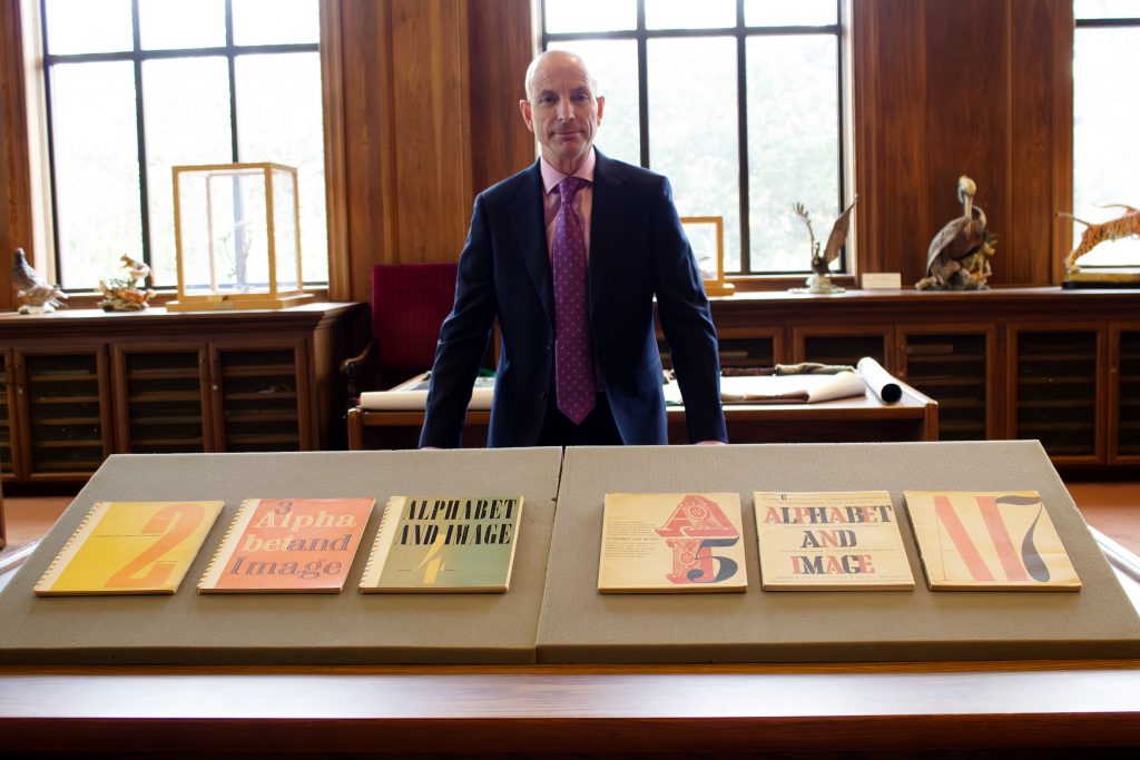 Doubleday by historical papers on table in library