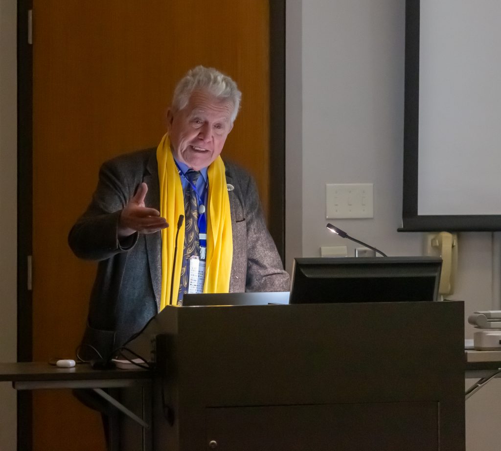 man in yellow scarf