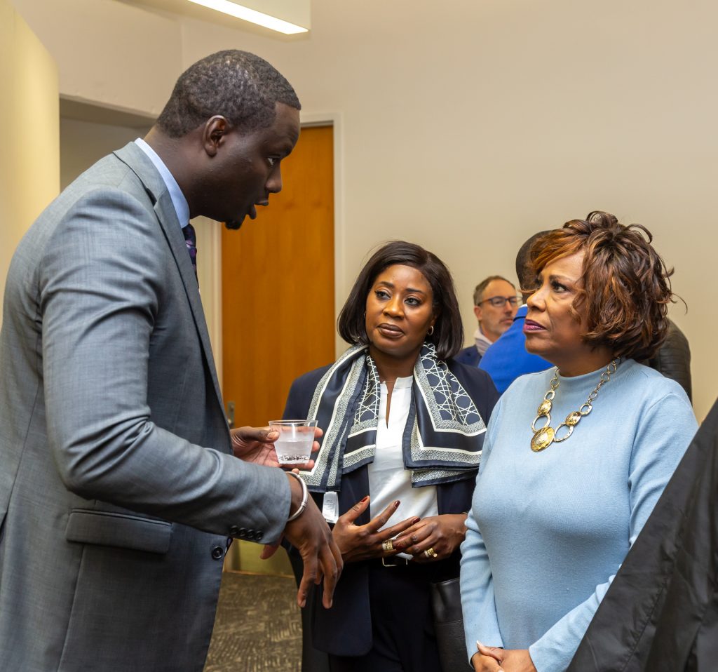 mayor talking with tall African man