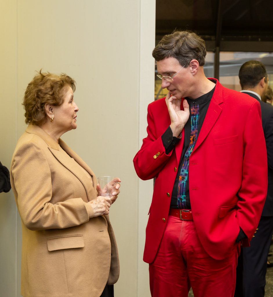 man in bright red suit