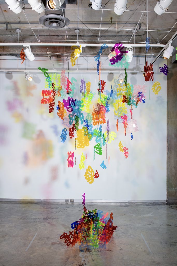 dangling colorful sculptures by Cece Moseley